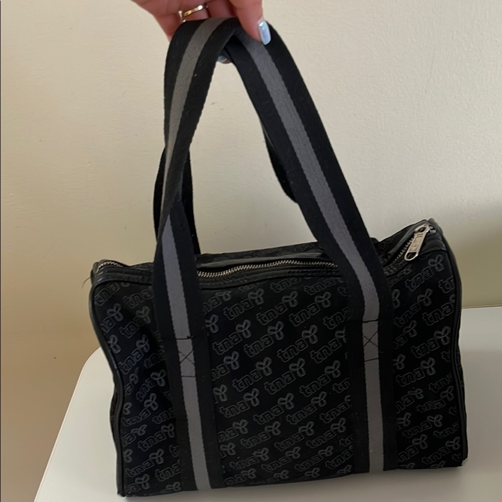 TNA aritiza black and grey duffel